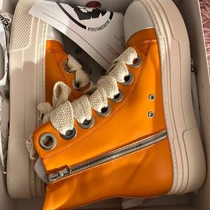 Orange high top boot